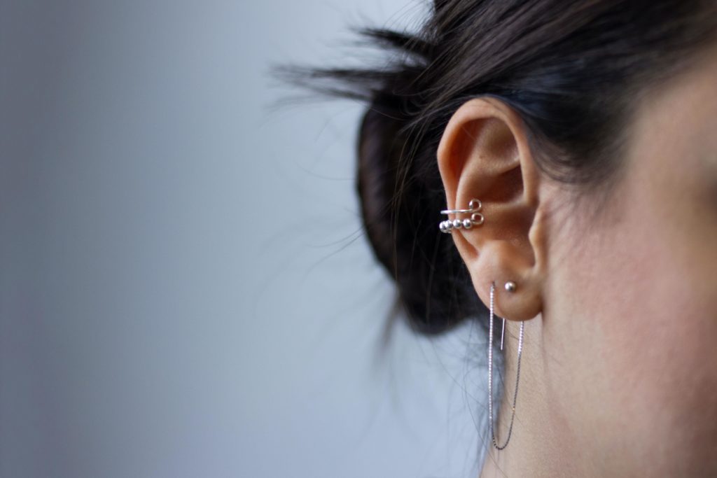 an ear with two piercings